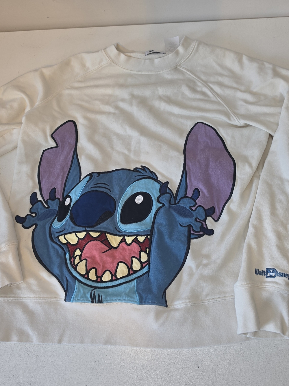 Disney White Sweatshirt with Blue Stitch Graphic and Pink Inner Ears